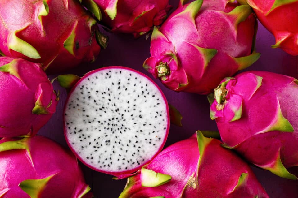 White Dragon Fruit on an old wooden table.